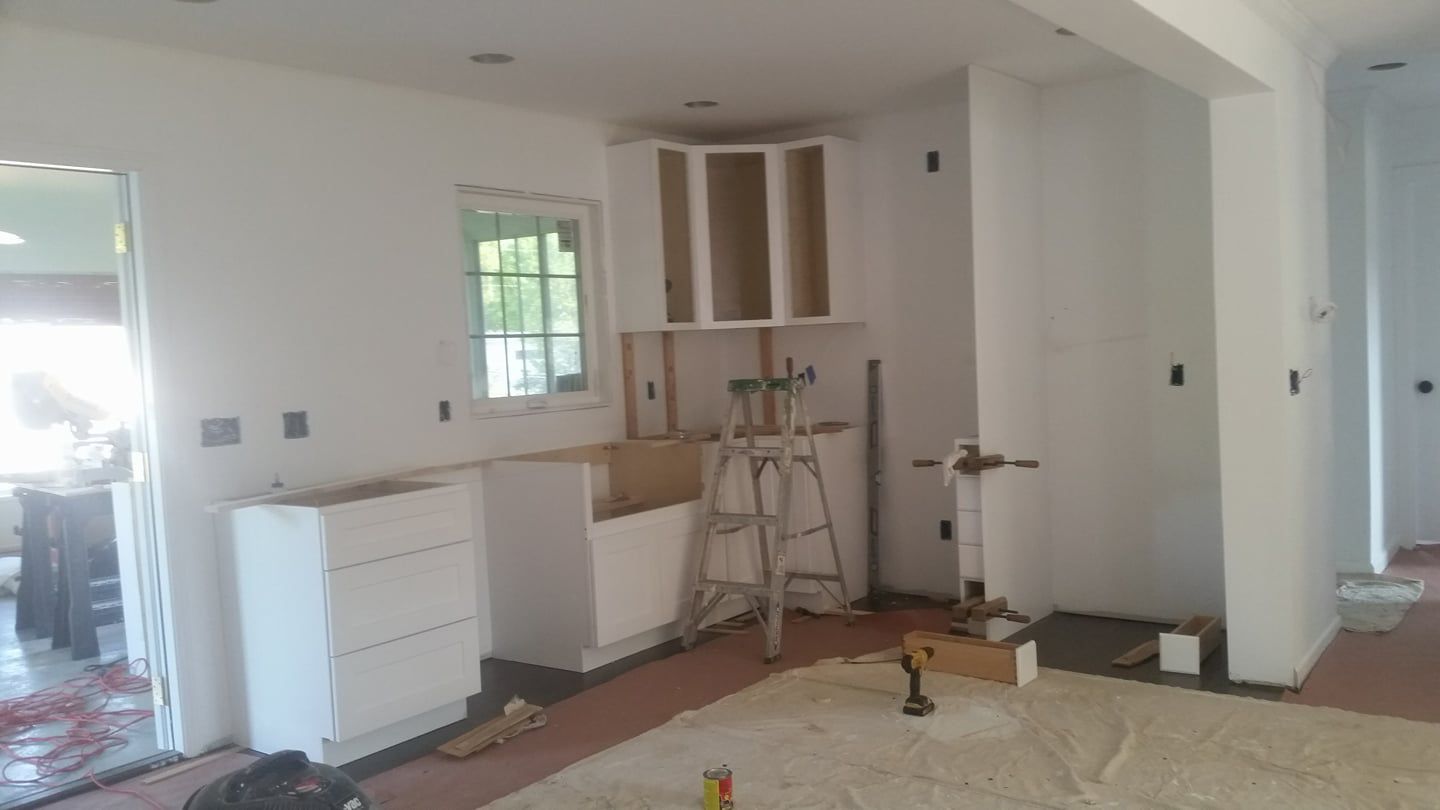 Kitchen renovation with white cabinets