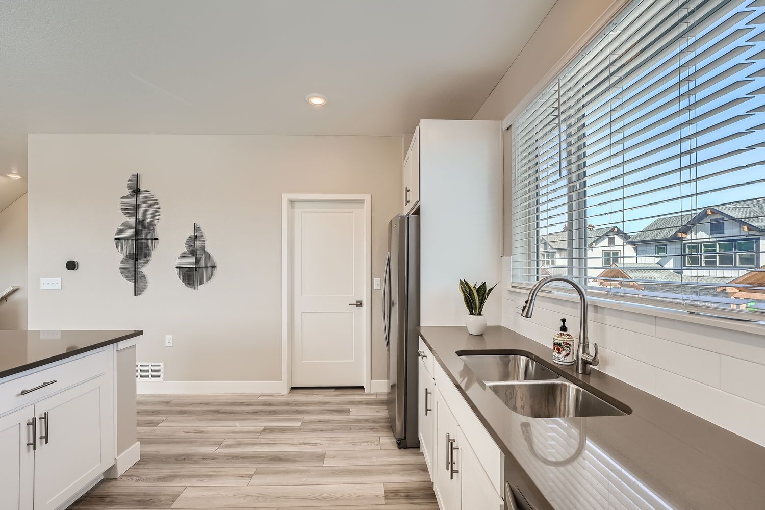 Blue floor plan, second-floor kitchen space with view of walk-in pantry