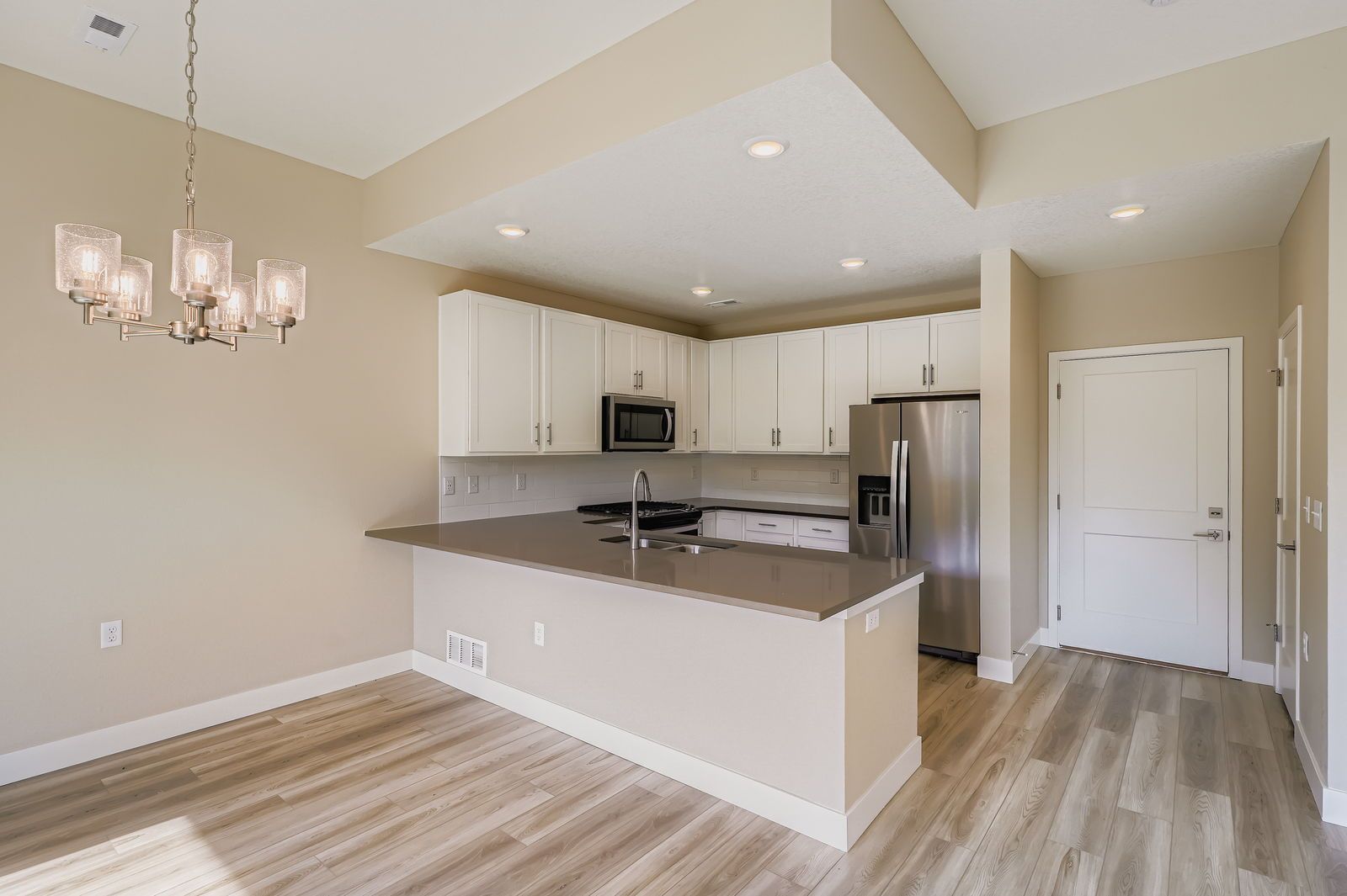 Two-story townhome kitchen and dining