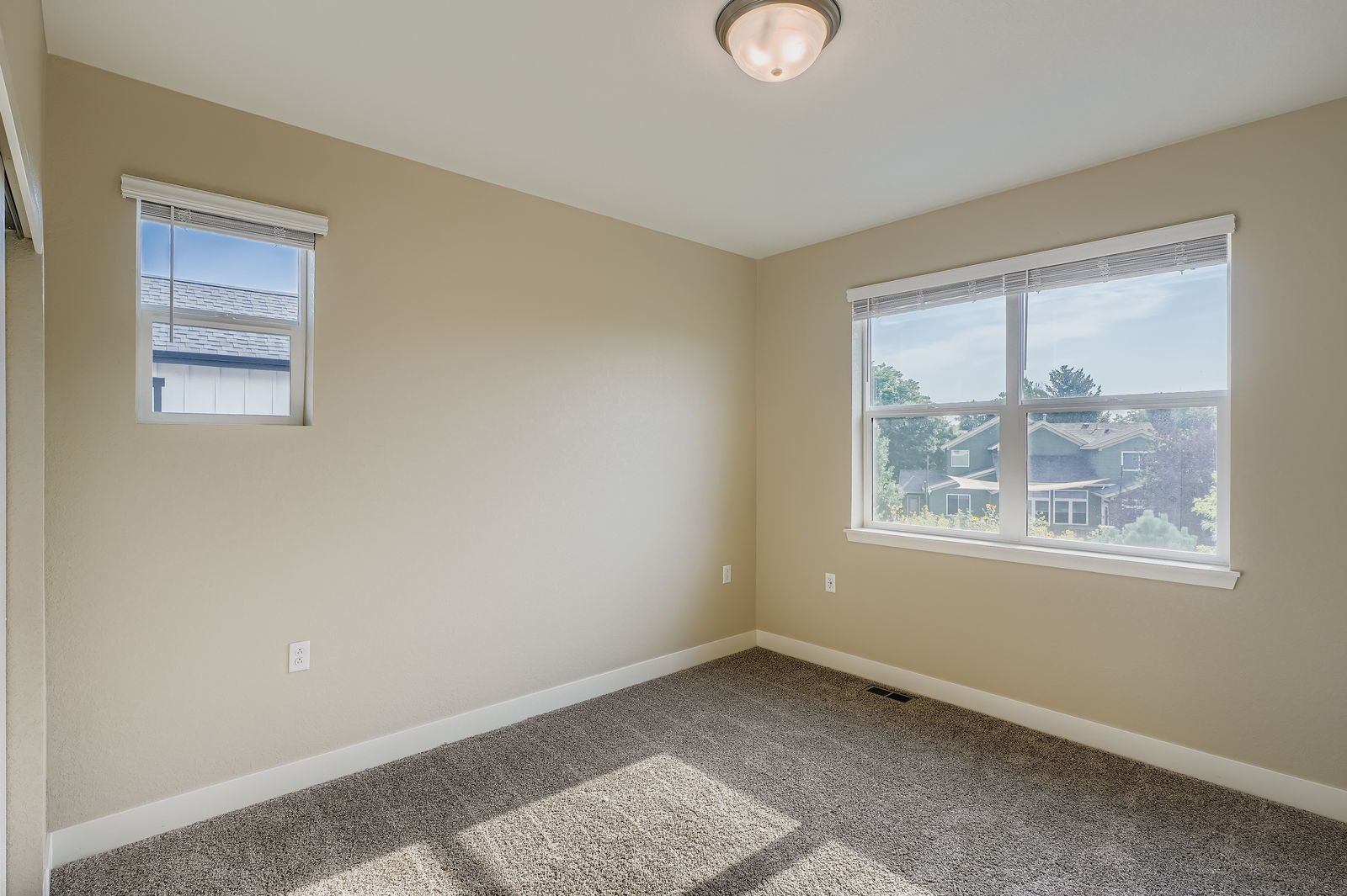 Two-story townhome bedroom