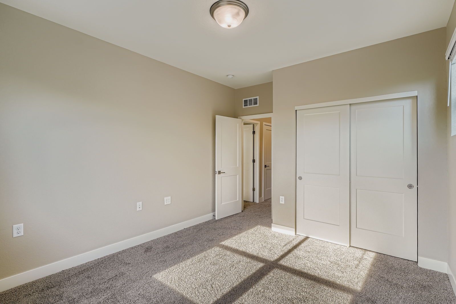 Two-story townhome bedroom with closet