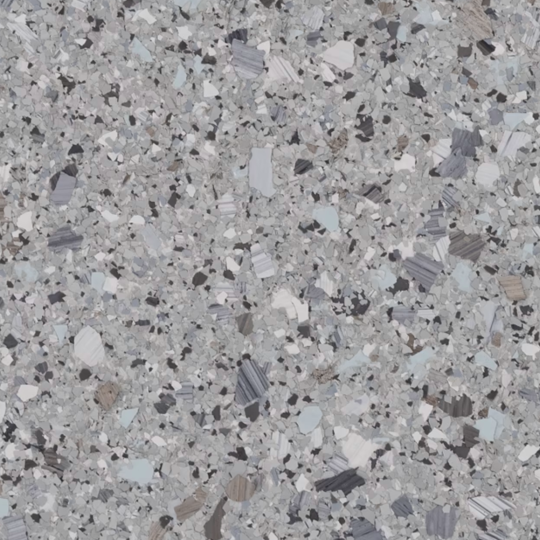 Un gros plan d'un comptoir en granit gris et noir.