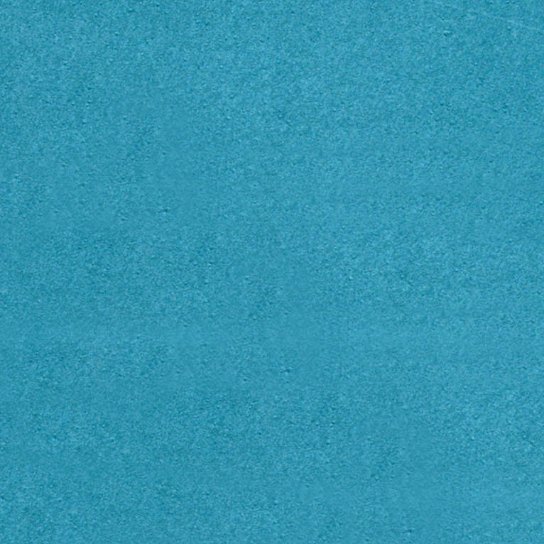 Un gros plan d'une texture de papier bleu.