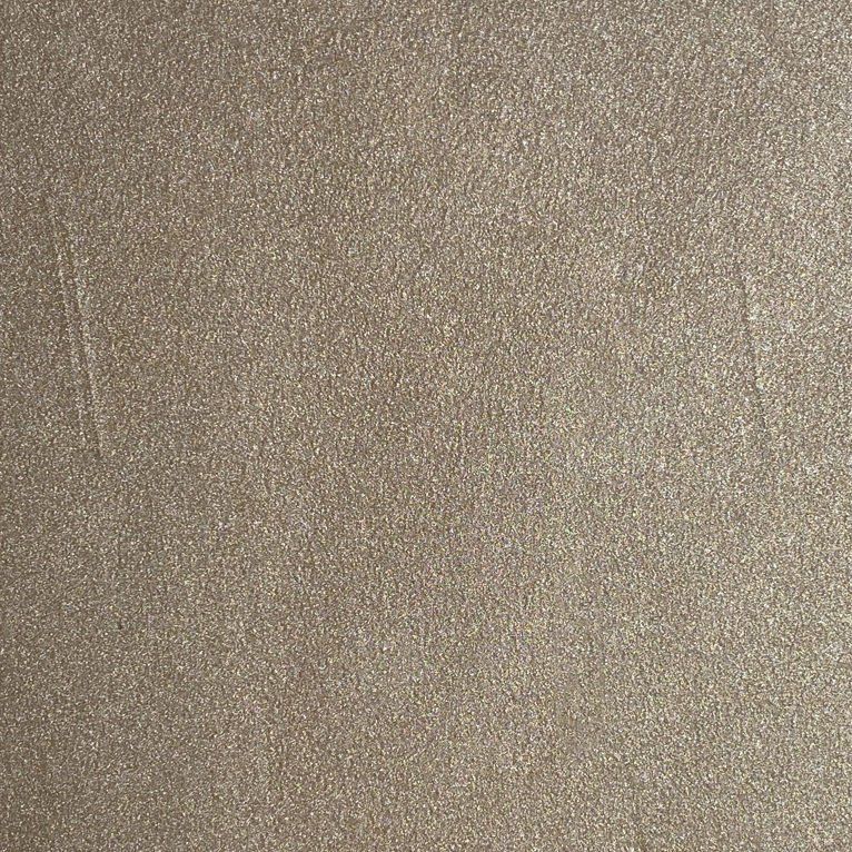 Un gros plan d'un morceau de papier avec une texture granuleuse.