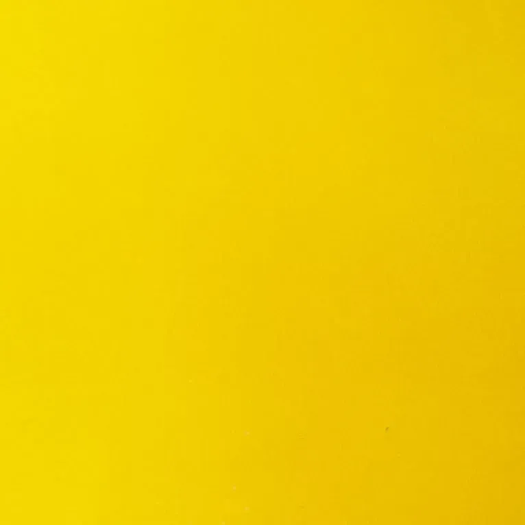 Un gros plan d'un fond jaune vif.