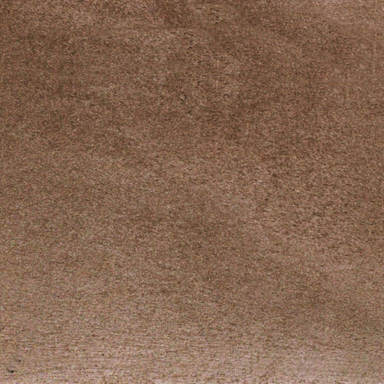 Un gros plan d'une texture de tapis marron.
