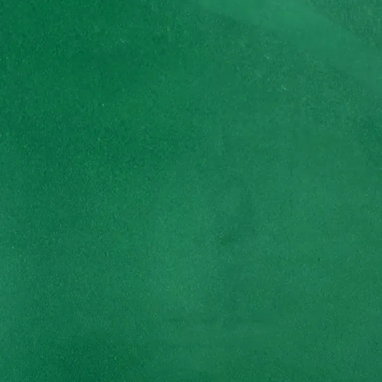 Un gros plan d'un morceau de papier vert.