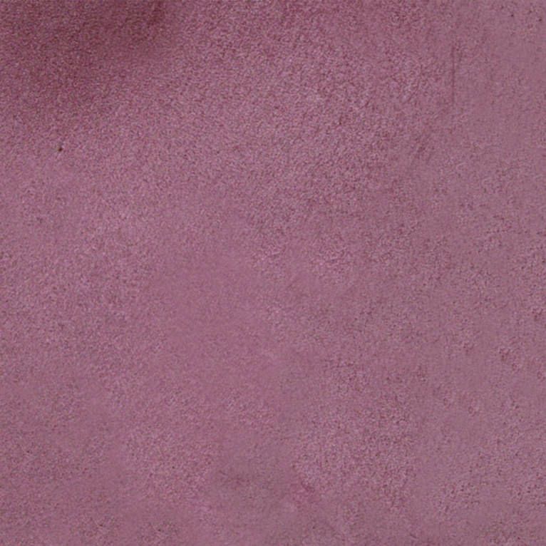 Un gros plan d'une surface de béton violette.