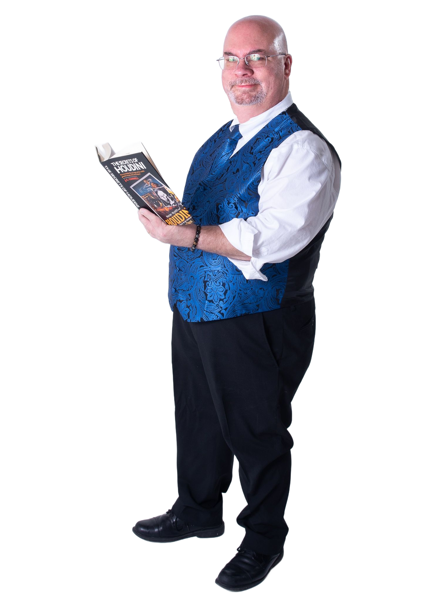 a man in a blue vest and black pants is holding a book about houdini