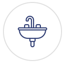 A line drawing of a sink with a faucet in a circle.