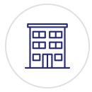 An icon of a building in a circle on a white background.