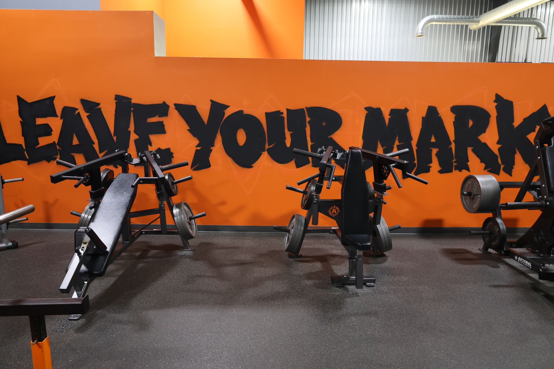 A gym with a sign that says leave your mark