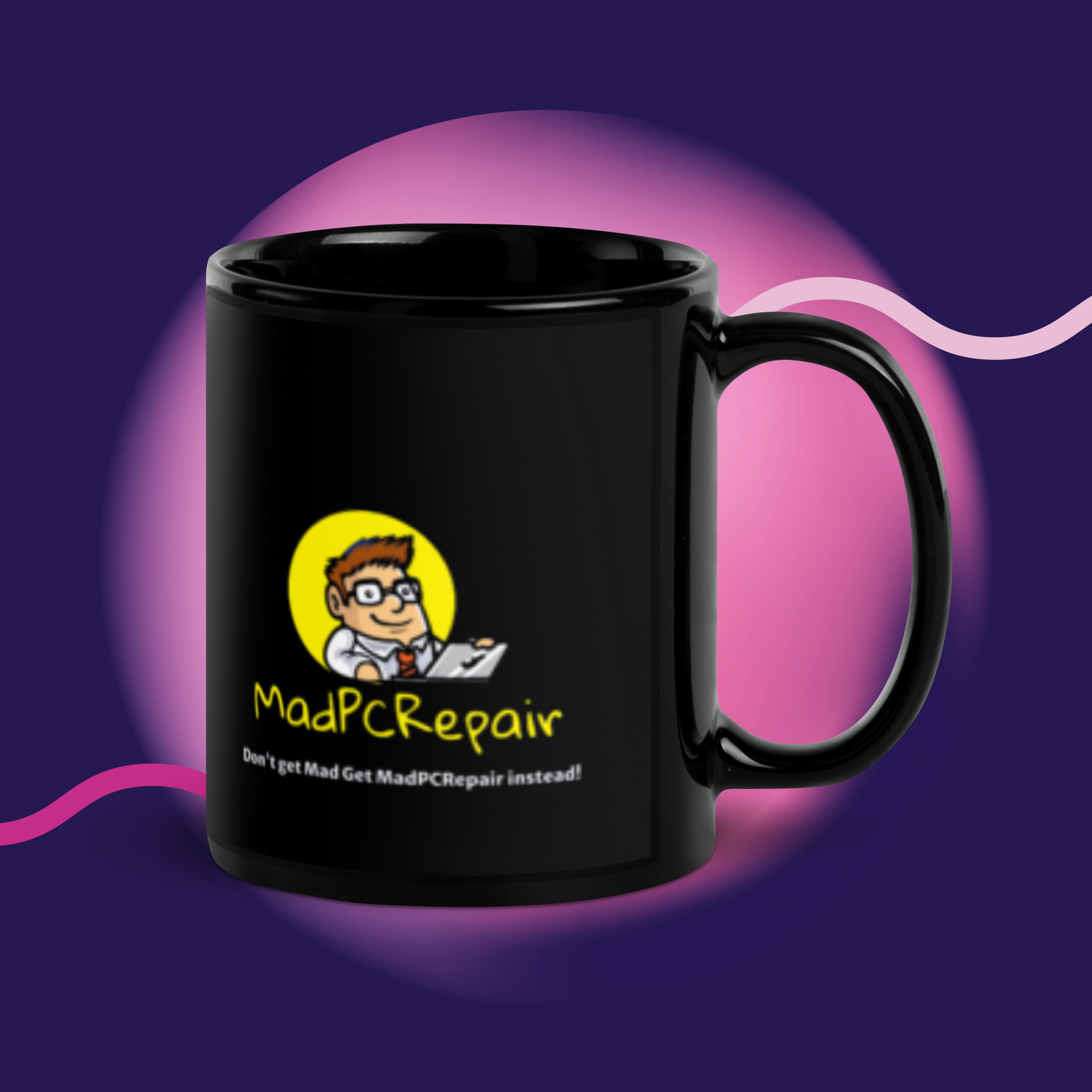 A black mug that says mad pc repair on it