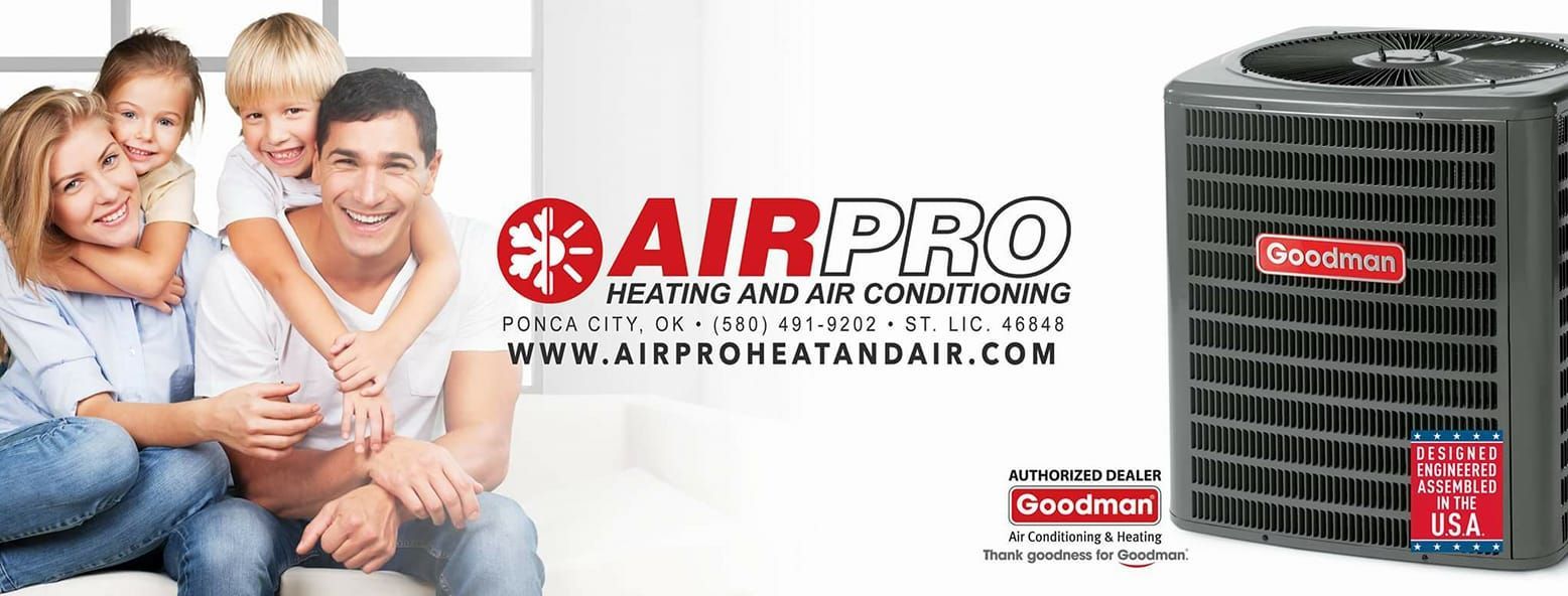 AirPro Heat and Air Ponca City Oklahoma Family smiles in front of AirPro ad with HVAC unit.