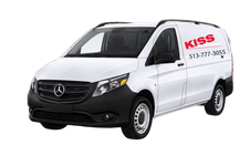 A white van with the word kiss on the side is on a white background.