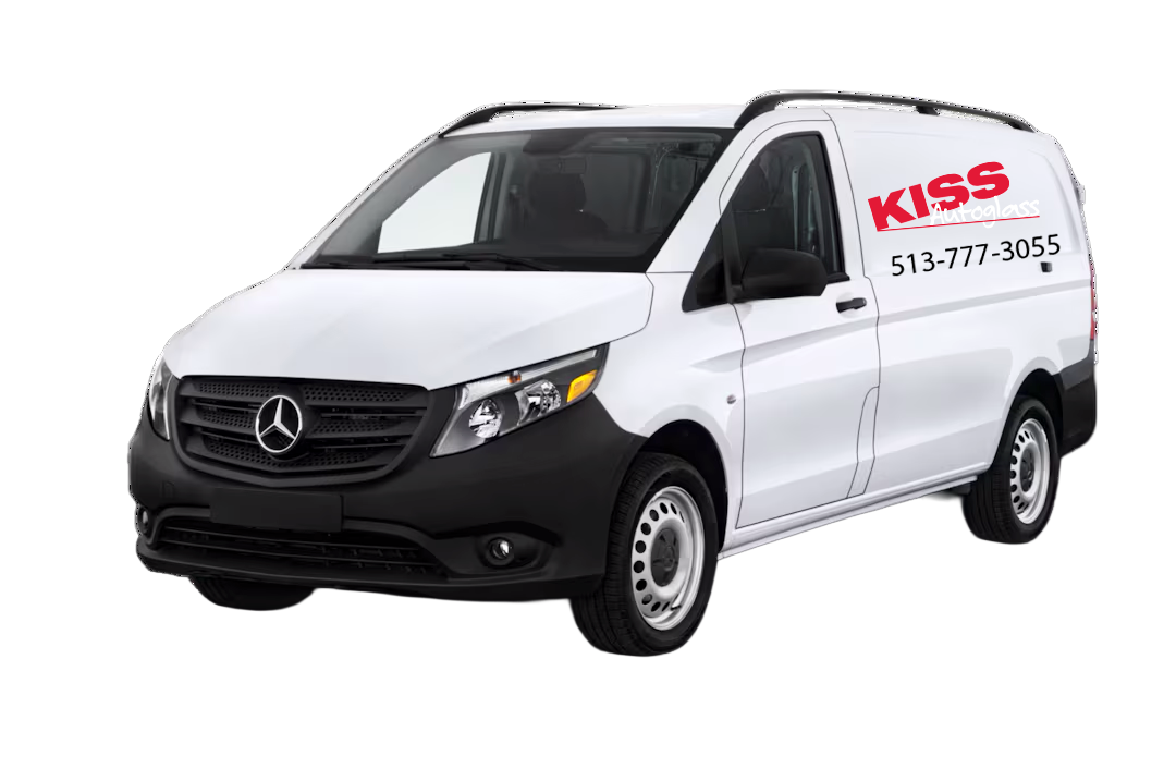 A white van with the word kiss on the side is on a white background.