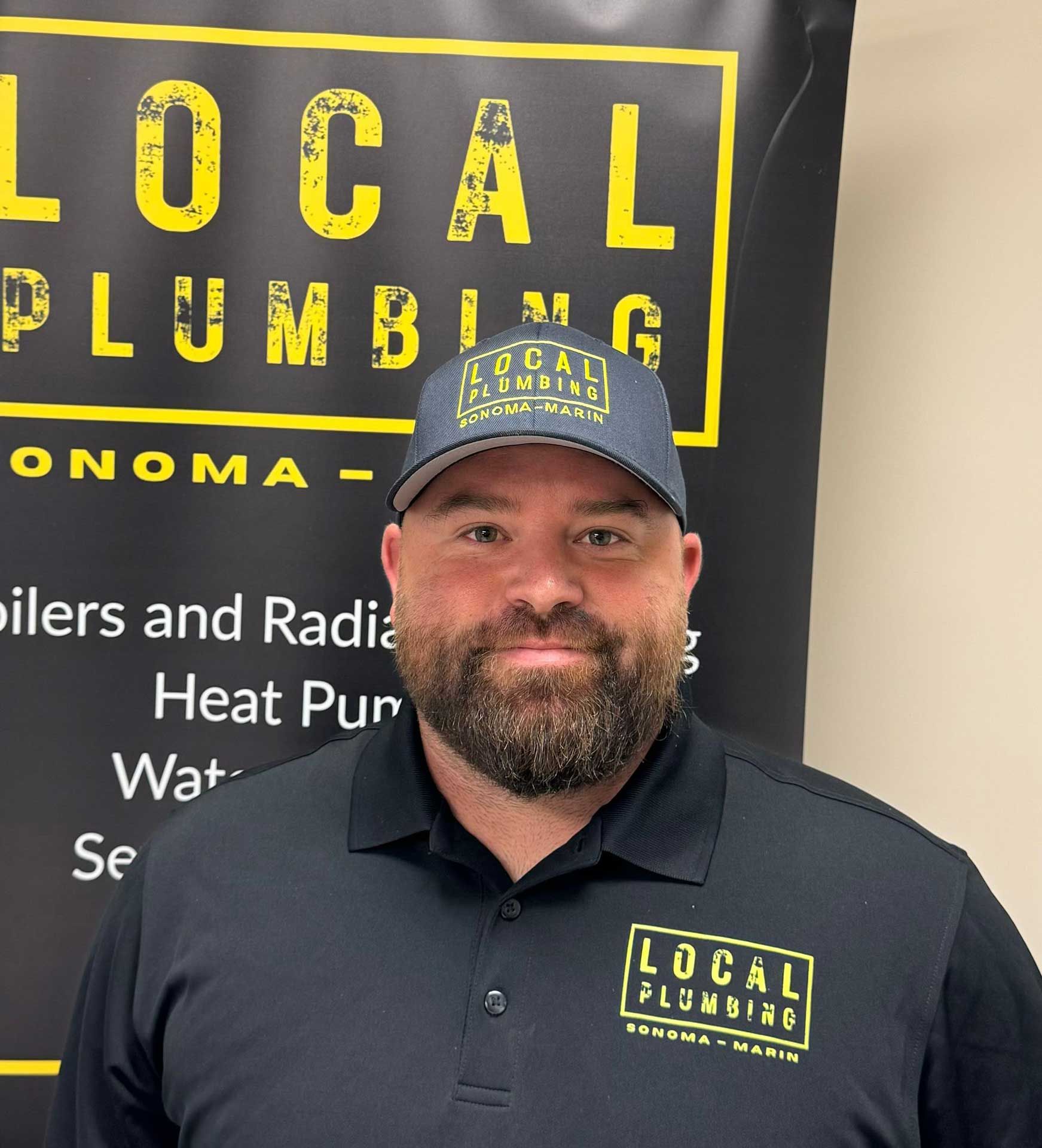 Man wearing hat and shirt with