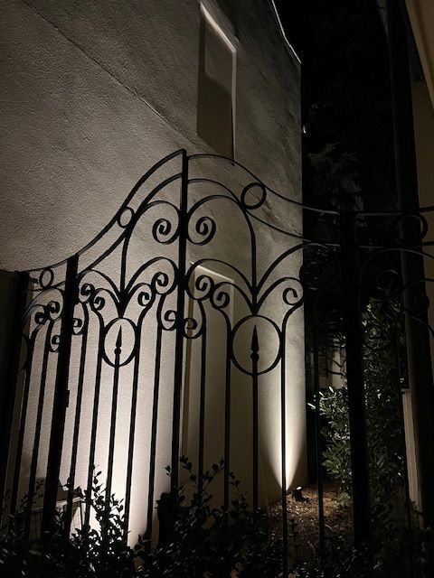 A building with a lot of windows is lit up at night