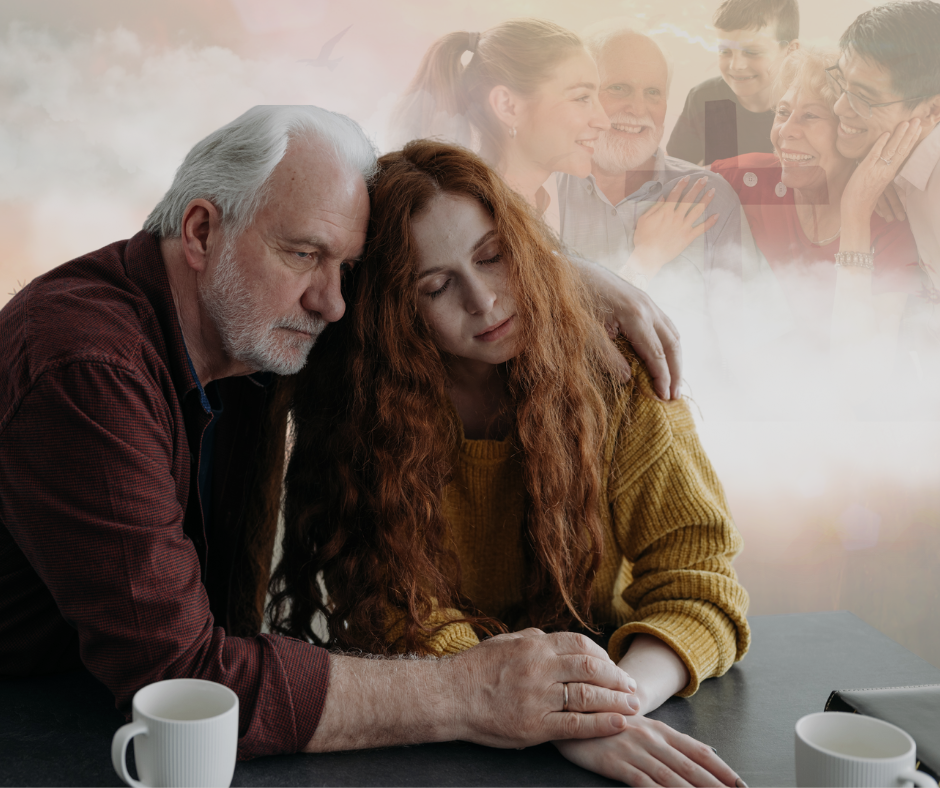 A man and a woman are sitting at a table holding hands.