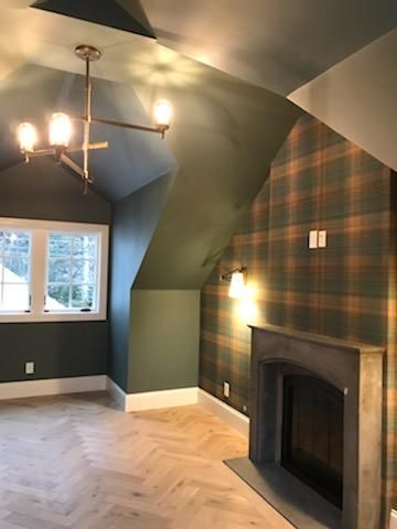 There is a fireplace in the middle of the room.