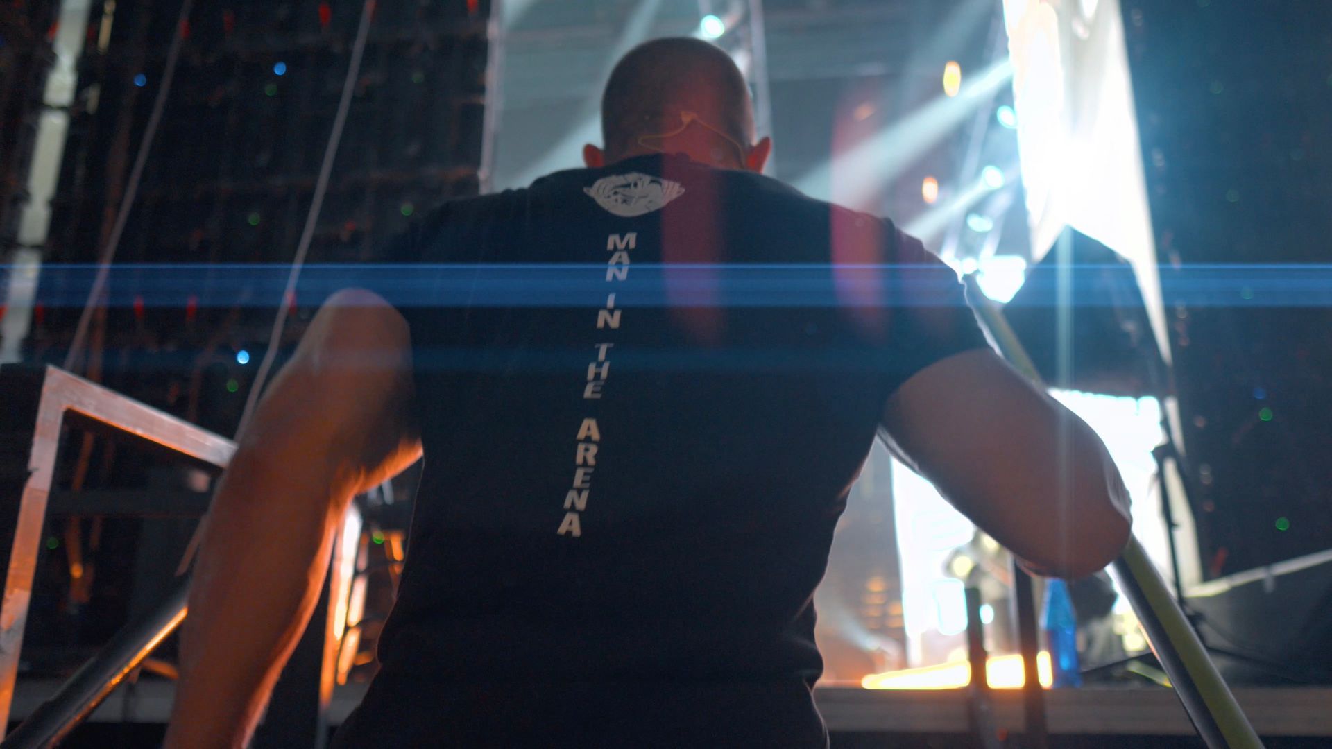 Speaker delivering a powerful live talk on stage to an engaged audience.