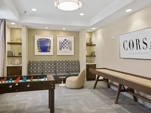Corsa Tuscan Village clubhouse with foosball table and shuffle board in Salem, NH.