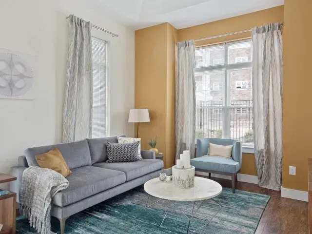 Corsa Tuscan Village apartment living room with furnitures and modern design.