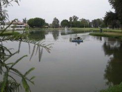 A calm lake with a small aeration device in the center