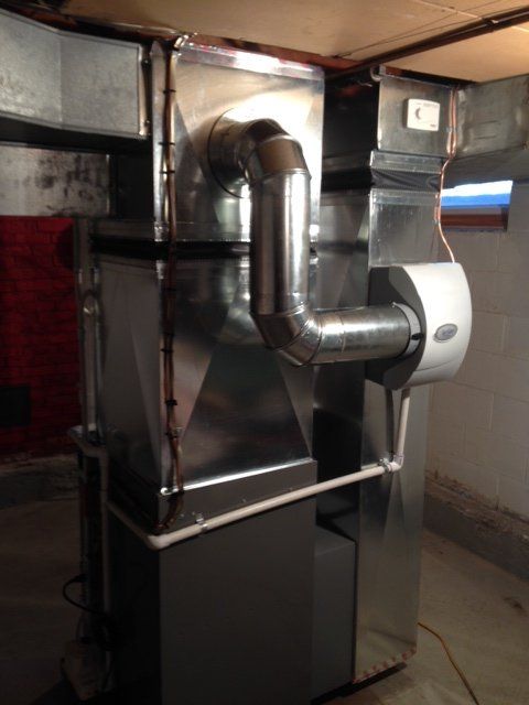 New heating unit attached to the duct work in Albany, NY