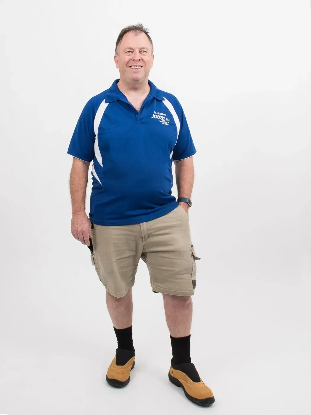 A Man in A Blue Shirt and Khaki Shorts Is Standing — Jobs2BDone in Woy Woy, NSW