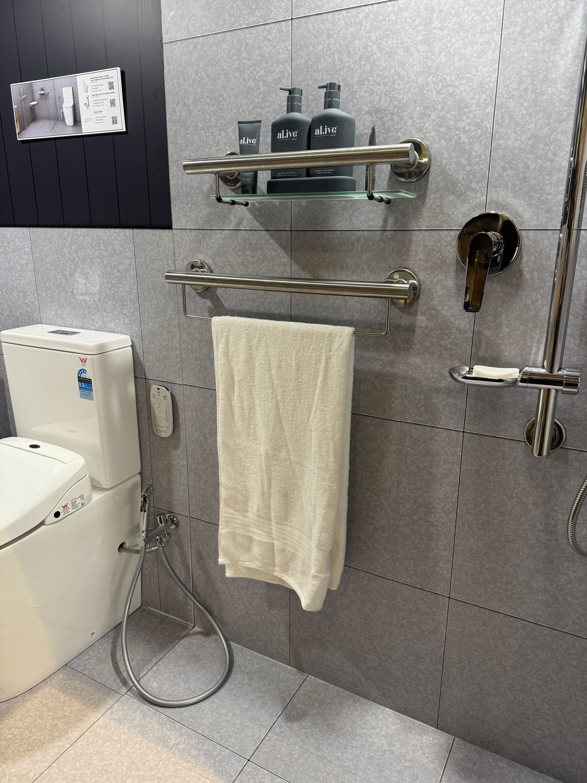 A White Toilet Is Sitting on A Tiled Floor in A Bathroom — Jobs2BDone in Woy Woy, NSW