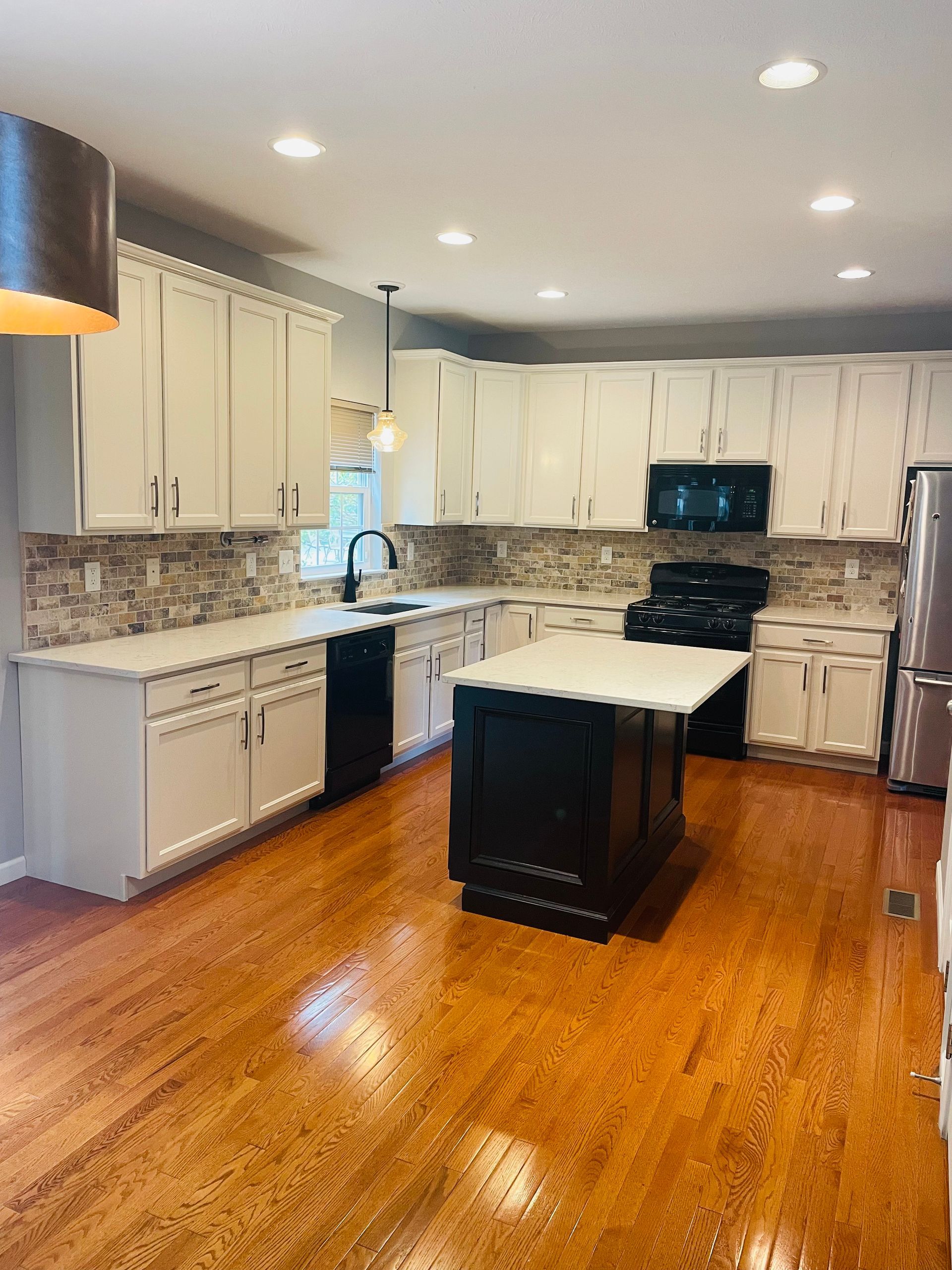 Kitchen cabinet refinishing project in Fairlawn Ohio by Inspired Services & Painting