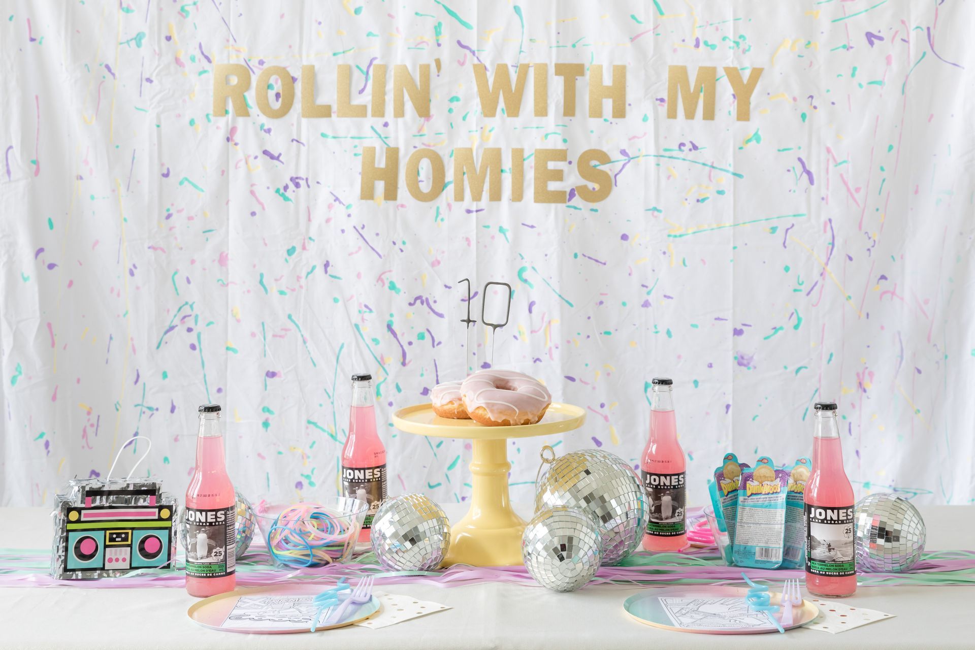 a table set up for a party with a sign that says 