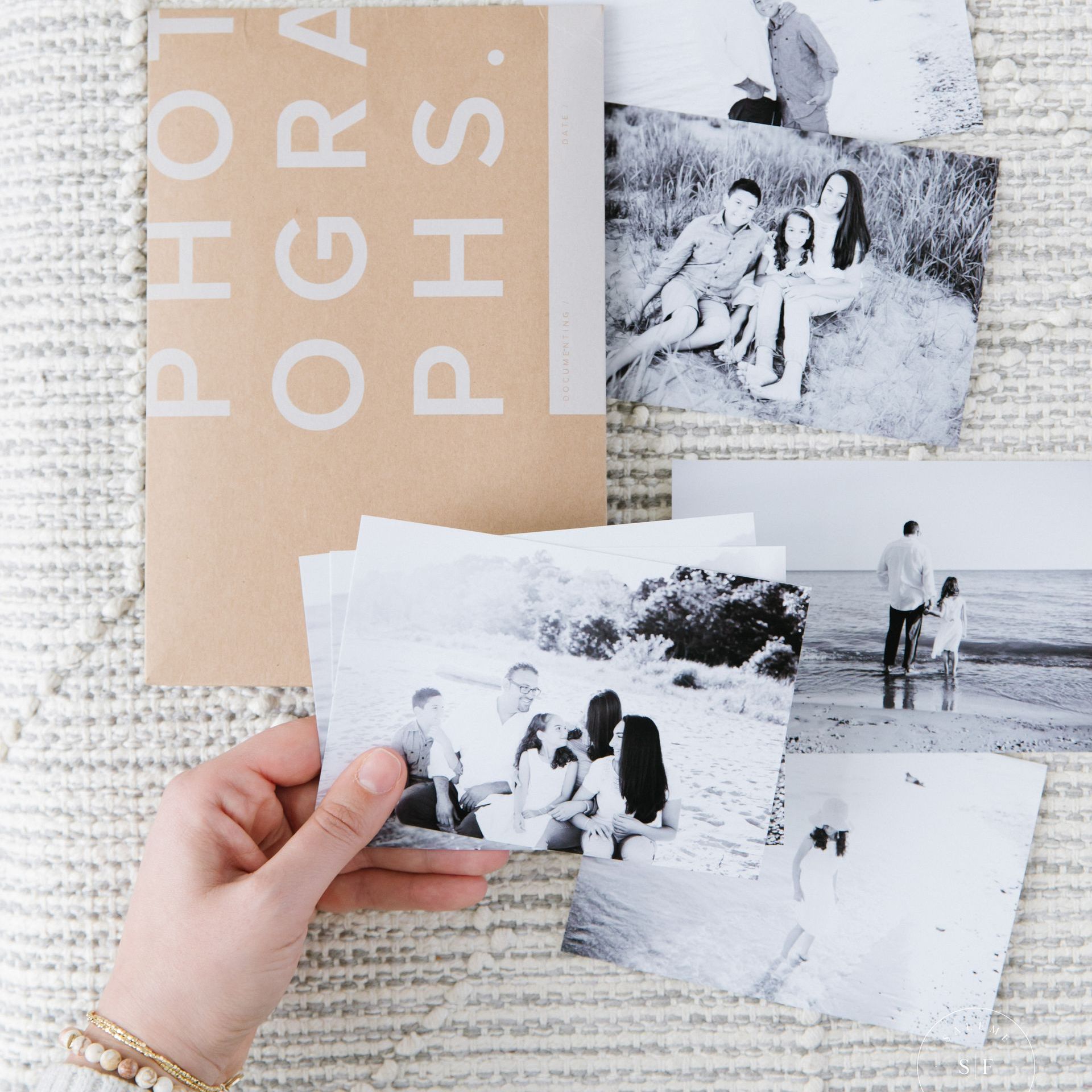 a person is holding a collage of photo memories