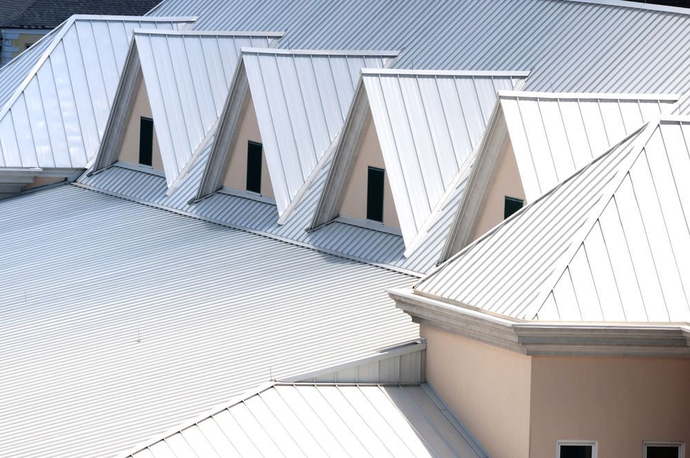 White Triangular Shaped Aluminum Metal Roof — ACT Roofing in Yass, NSW