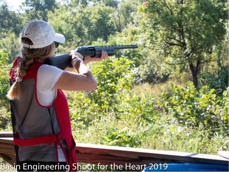 Energy industry professional participates in 2019 Shoot for the Heart tournament.