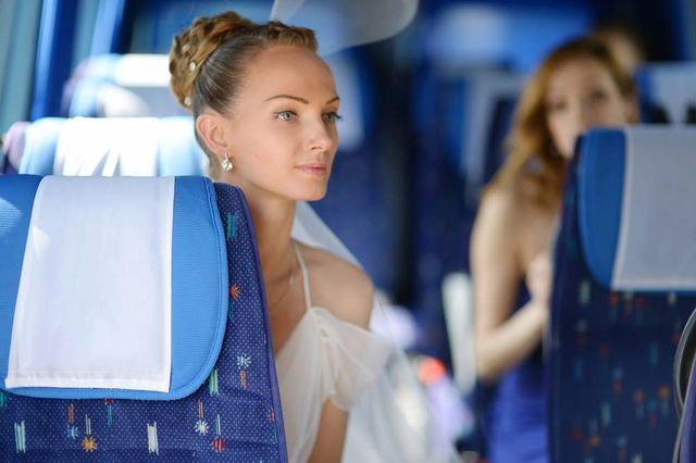 Woman Sitting on a Bus Seat — J & B Bus and Coach Pty Ltd In Kingscliff, NSW