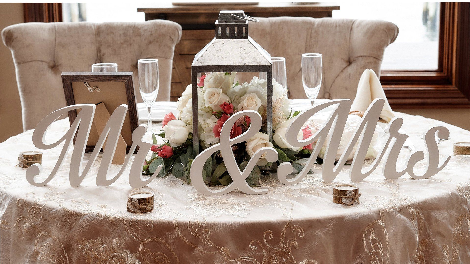 A table with a mr. and mrs. sign on it