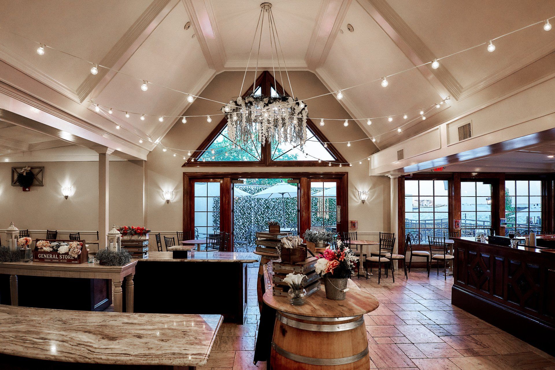 A large room with a chandelier hanging from the ceiling
