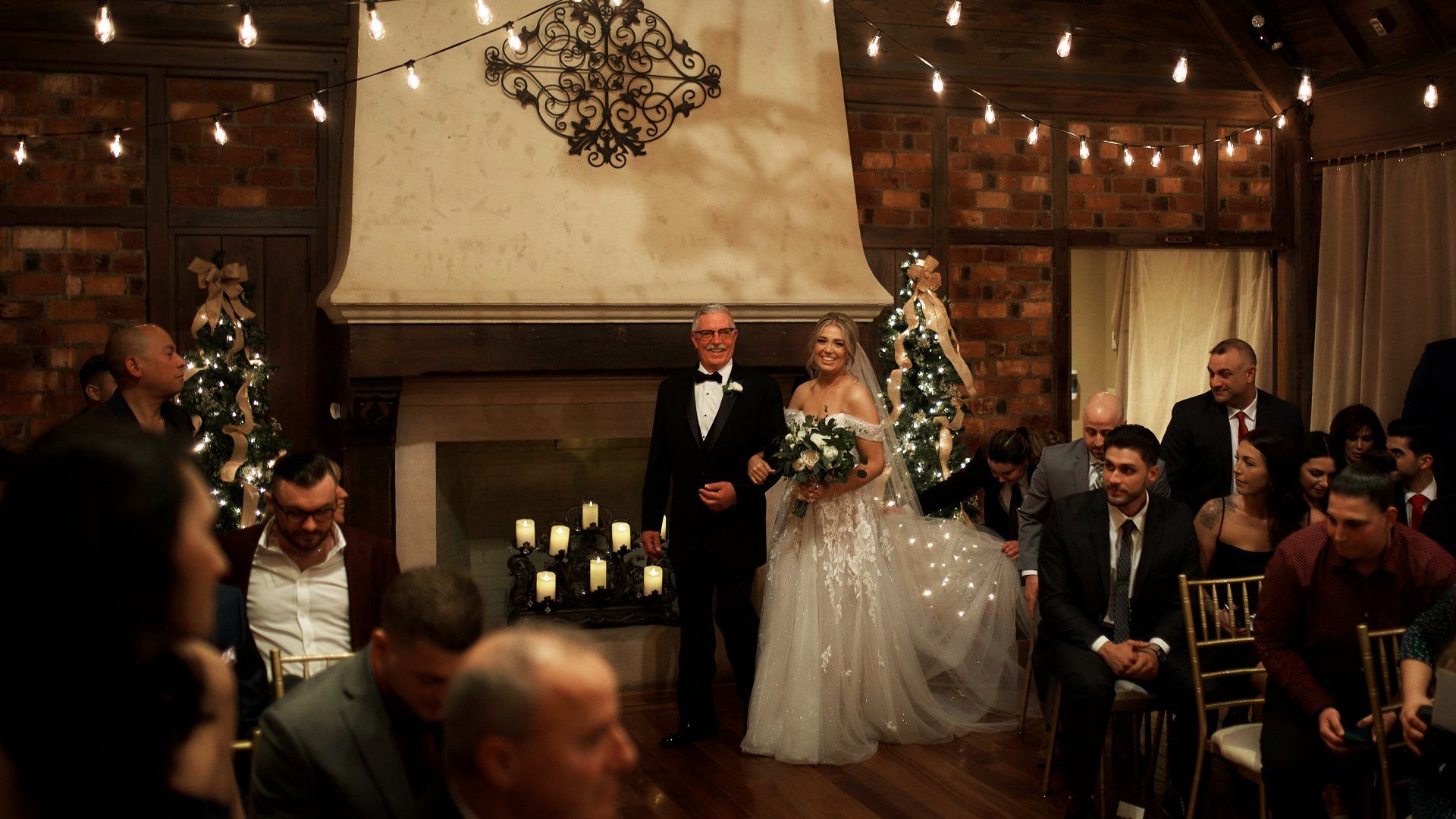 A bride and groom are walking down the aisle at a wedding ceremony.
