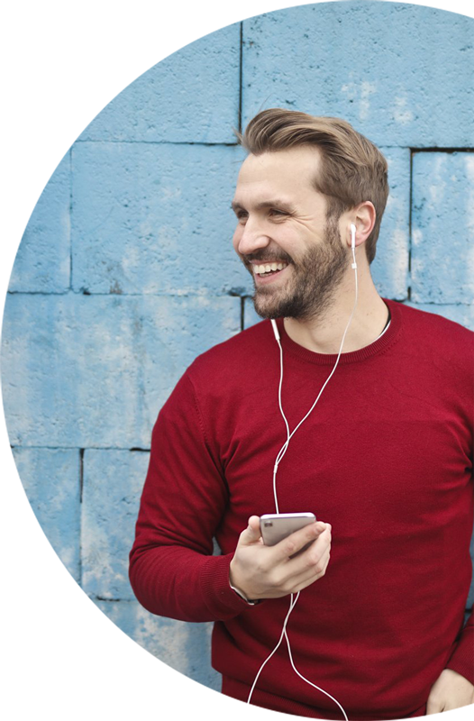 man with a red shirt listening to music happy