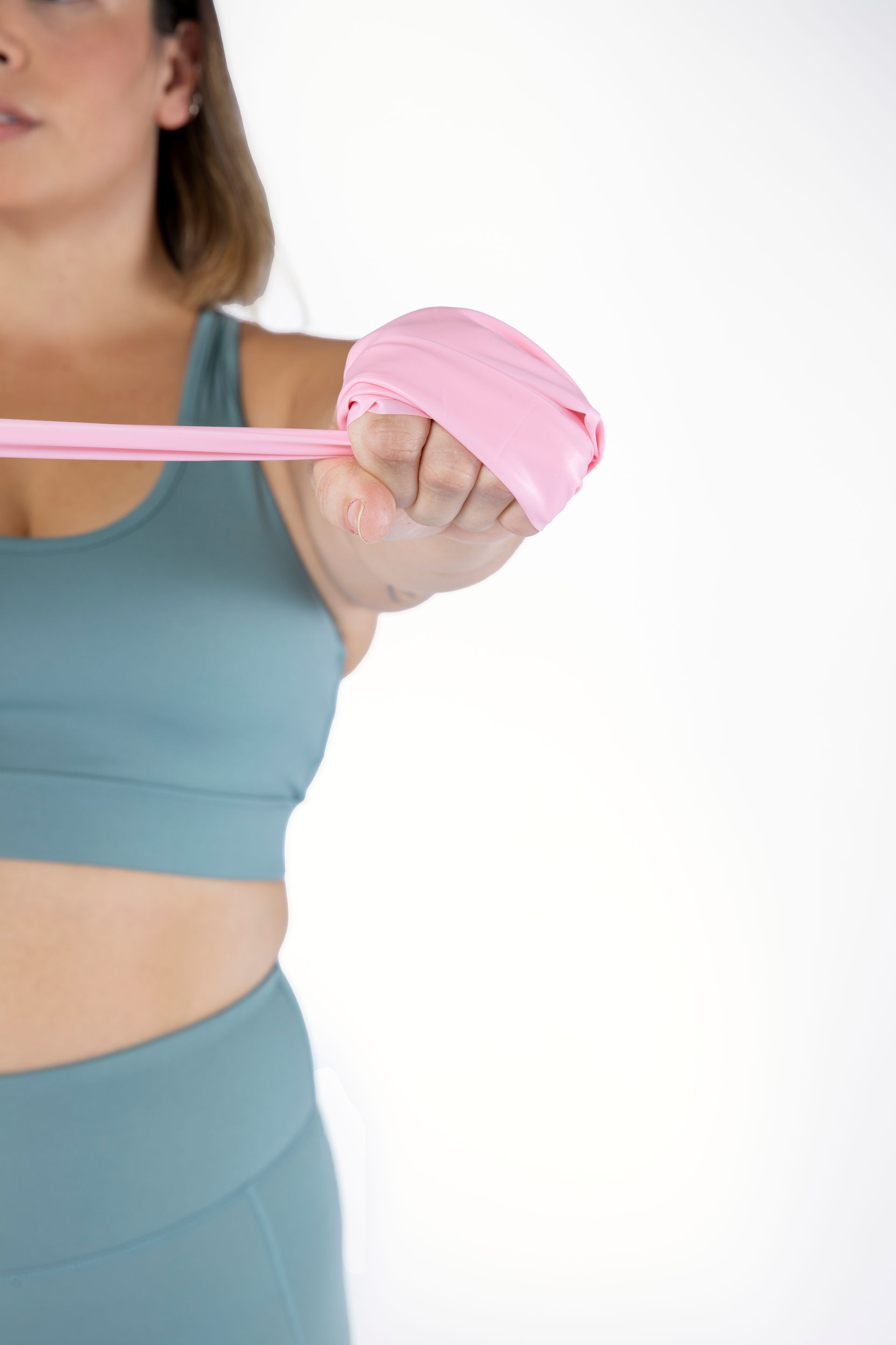 woman training with elastic band