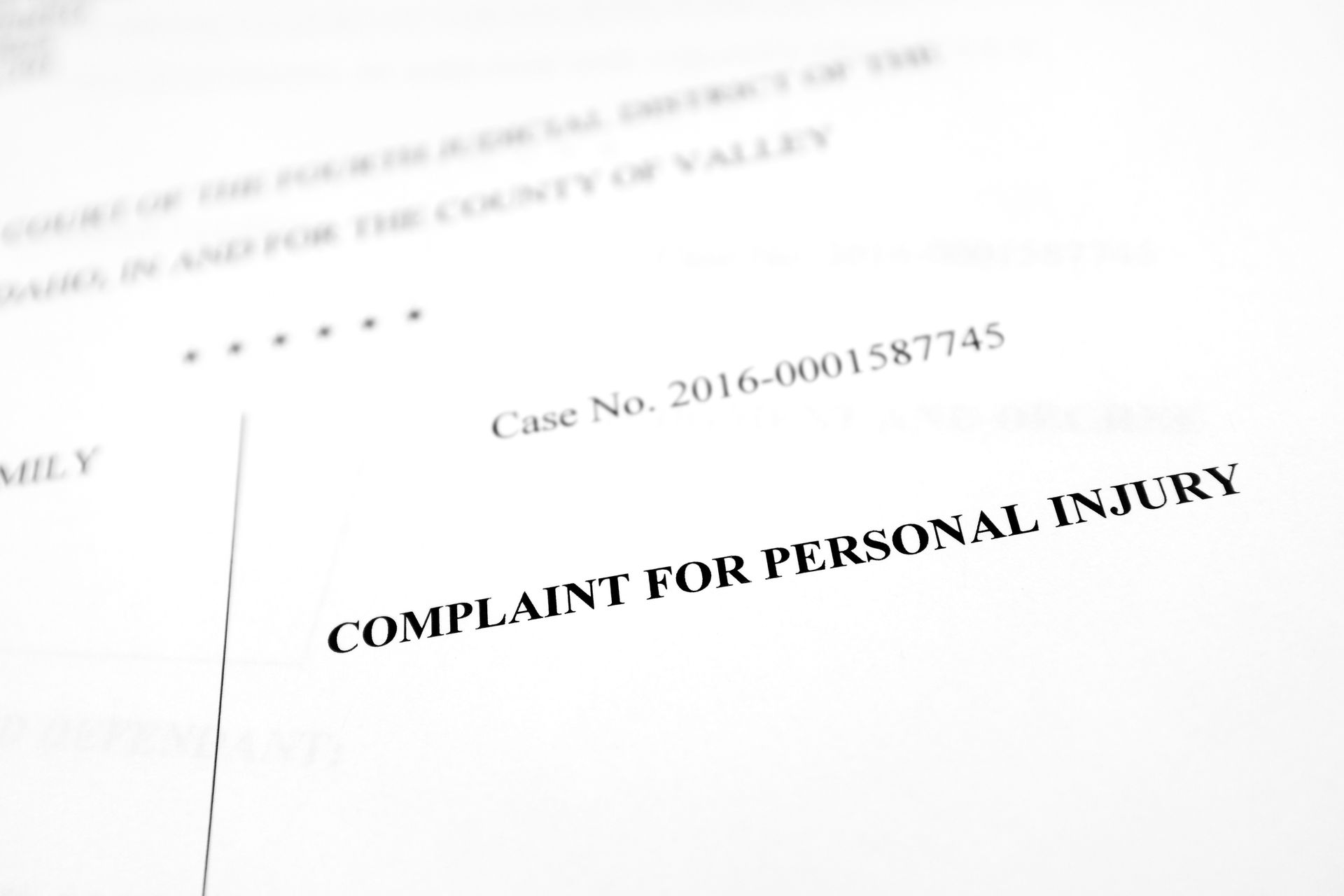 A close up of a complaint for personal injury form