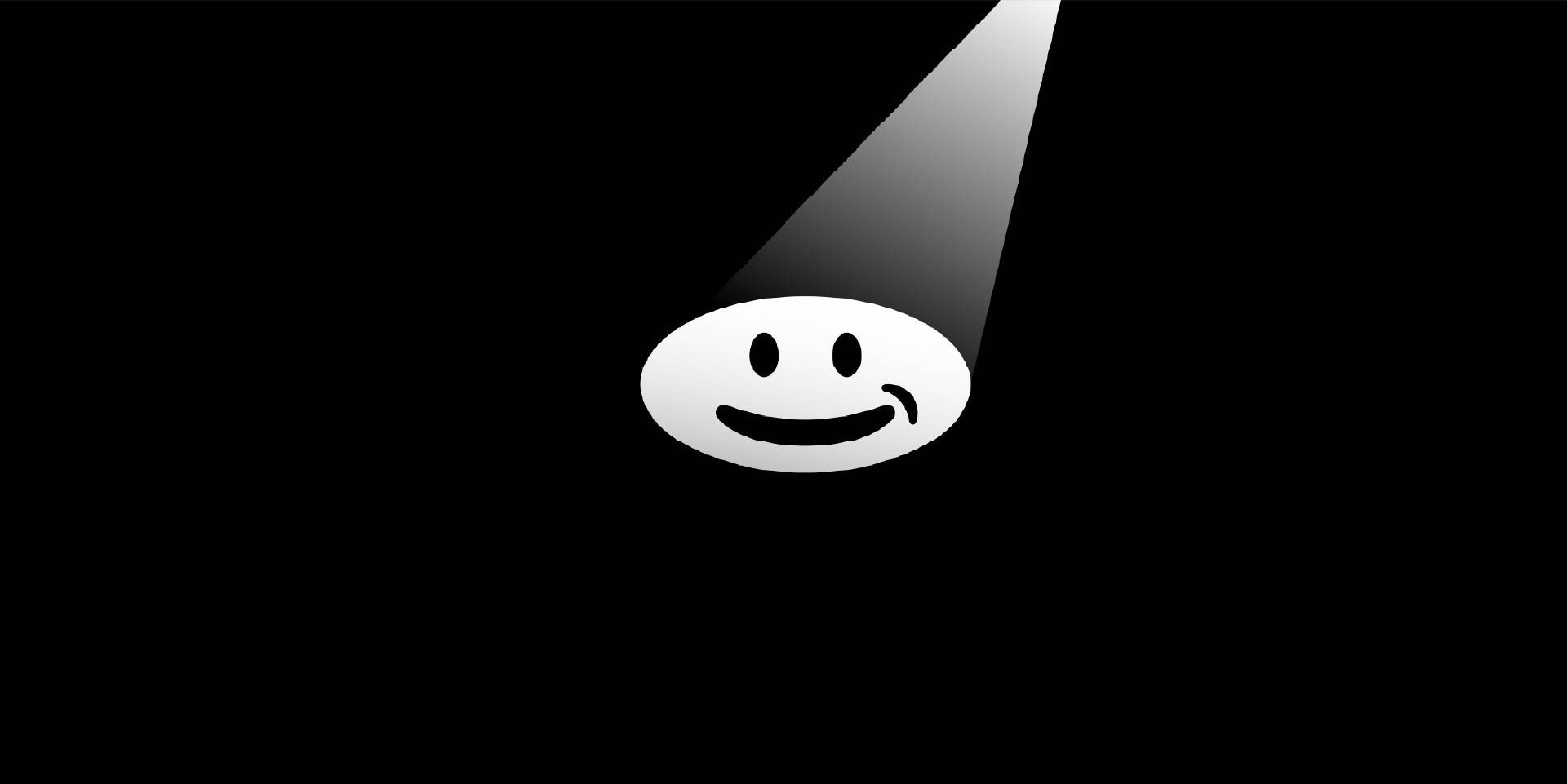 Smiling oval shape in spotlight against a black background.