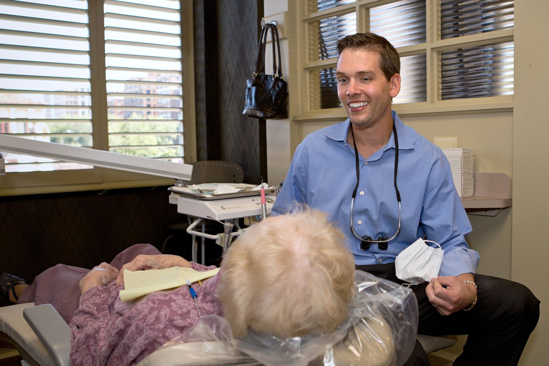 Dr. Perry walking a patient through home care services