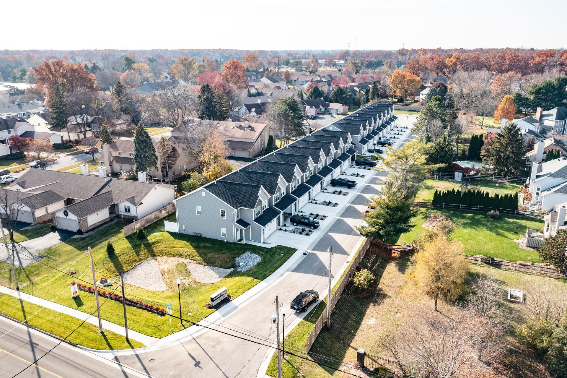 Photo of a row of two-story houses on a single street