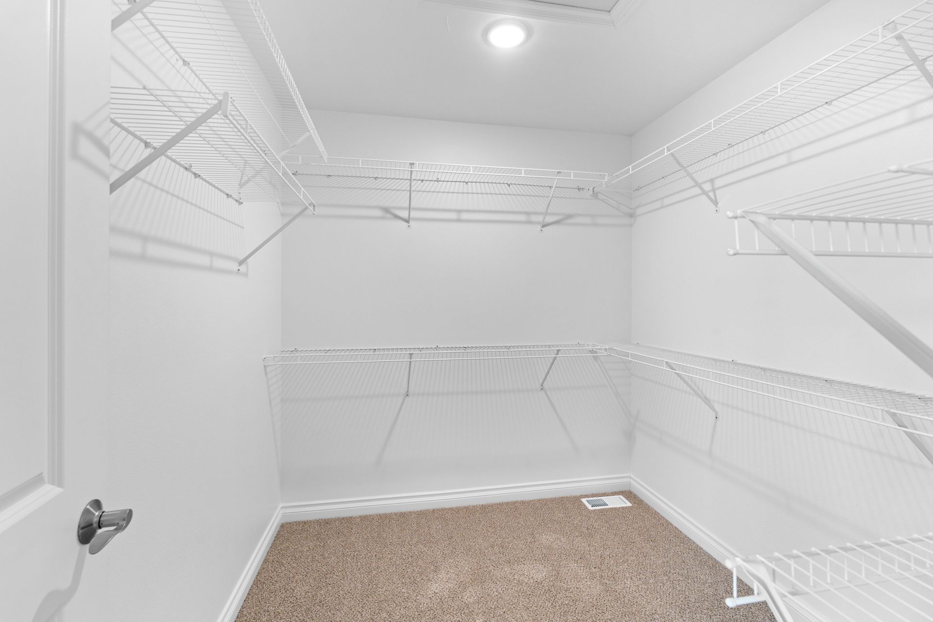 Photo of a large walk-in closet