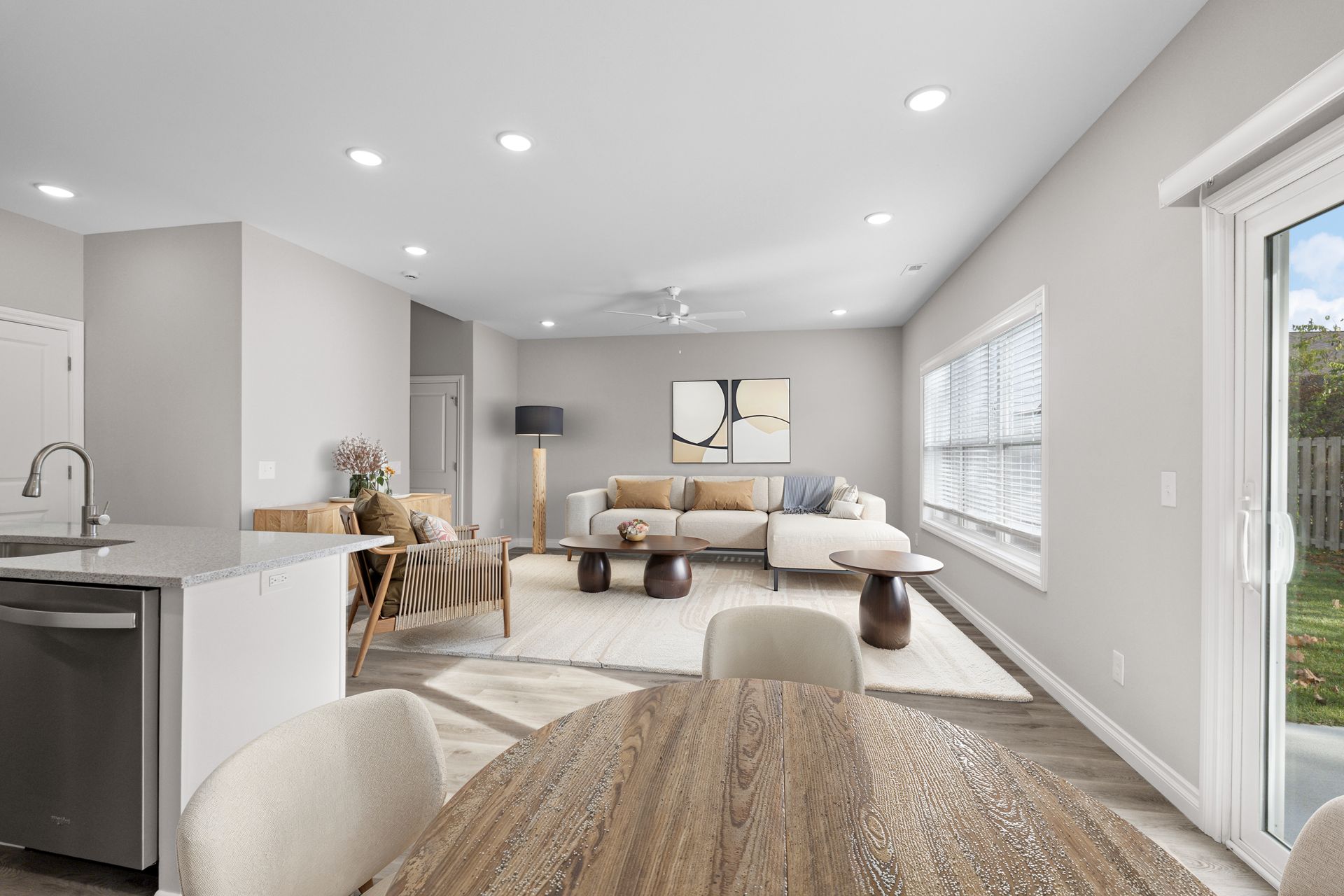 Photo of a dining table showing the kitchen in the background