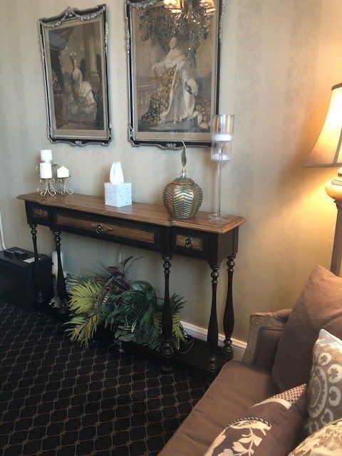 A living room with a couch and a table