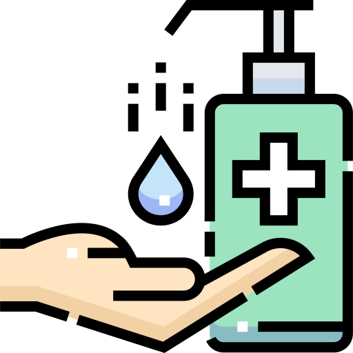 A hand is holding a bottle of hand sanitizer.